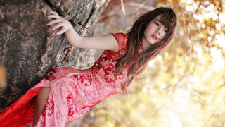 Woman red dress rock wall - a rock wall free wallpaper