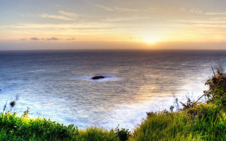 Sunset lake hill beach ocean - a view of a body free wallpaper