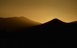 Mountain hills bird trees sunset - free minimalism wallpaper