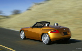Yellow sports car hillside driving - a hill side free wallpaper for desktop