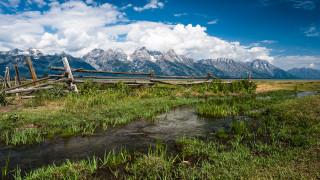 Wooden fence river mountains clouds - a river and mountains free wallpaper