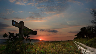 Sunset field wooden sign road - a wooden sign free wallpaper