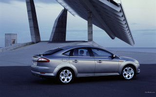 Silver car building sculpture clouds - didier mouron free wallpaper
