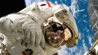 Spacesuit pilot earth space station - free space wallpaper