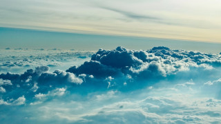 Sky clouds plane wing ocean 2 - a view of the sky free wallpaper