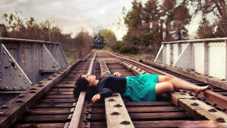 Woman laying train track legs - brooke shaden free wallpaper