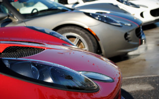 Red sports car closeup parking - other car free wallpaper