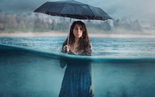 Woman umbrella water cloudy sky - the water under a cloudy sky free wallpaper