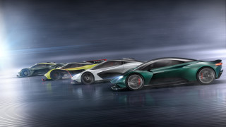 Sports cars line up wet - a wet surface free wallpaper for desktop