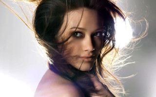 Woman blowing hair photorealistic portrait - constanceanne parker free wallpaper