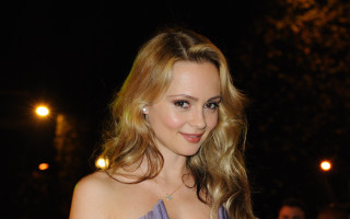 Daphne mcclure purple dress smiling - a man in the background free wallpaper