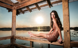 Woman dock lake sunset flare - sunrise time free wallpaper