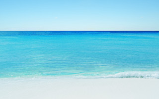 Beach ocean sky sand wave - a blue ocean free wallpaper for desktop