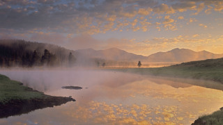Lake foggy sky person hill - free landscape wallpaper