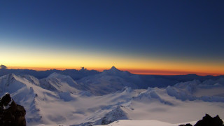 Mountain range sunset clouds city 2 - zenith view free wallpaper