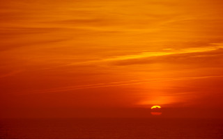 Sunset plane clouds ocean horizon 2 - a sunset free wallpaper for desktop