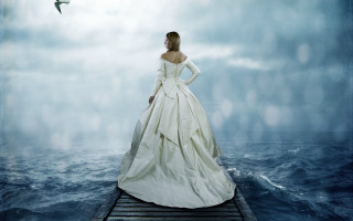 Woman white dress pier ocean - overhead in the sky free wallpaper