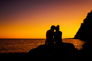 Couple rock ocean sunset romantic - sunset time free wallpaper