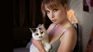 Woman cat bedroom curtains portrait - a window behind her free wallpaper