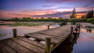 Wooden dock lake sunset cloudy - a wooden dock free wallpaper