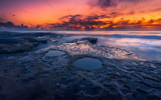 Sunset rocky beach hole water - the sand and water free wallpaper
