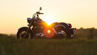 Motorcycle field sunset tiltshift lensflare - visible free wallpaper