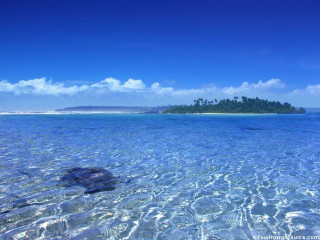 Small island clear water blue - a small island in the distance free wallpaper