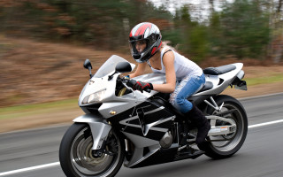 Woman motorcycle forest street motionblur - motion blur free wallpaper