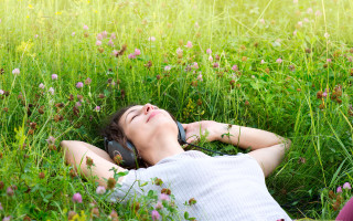 Woman flower field phone ears - headphone free wallpaper for desktop