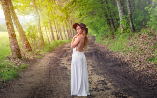 Woman white dress hat woods 2 - a dirt road free wallpaper