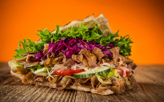Sandwich meat lettuce tomatoes wooden - an orange background free wallpaper