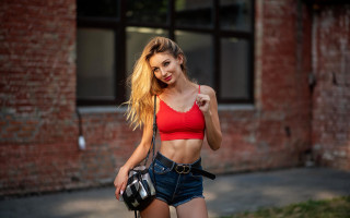 Woman red top denim shorts 2 - free portrait wallpaper