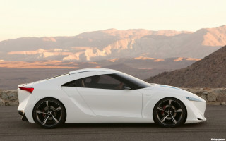 White sports car mountain range 2 - side profile free wallpaper