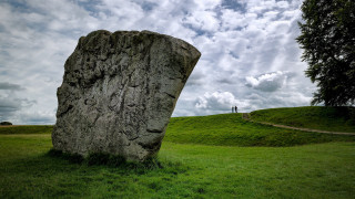 Large rock grassy field person - brian and wendy froud free wallpaper