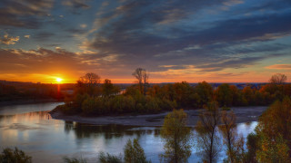 Sunset river bridge trees clouds - a sunset over a river free wallpaper