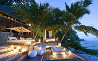 Lounge palm ocean night lights - a deck free wallpaper