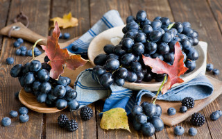 Grapes blackberries wooden table maple - caravaggio free wallpaper