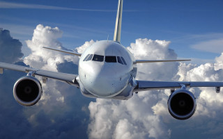 Large jetliner cloudy blue sky 2 - sky free wallpaper