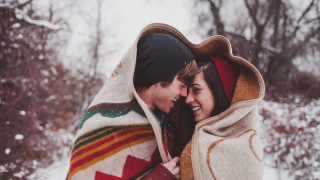 Man woman blanket snow smiling - a man and woman free wallpaper