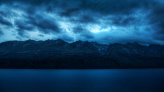 Mountain range dark sky water 2 - a dark sky above free wallpaper