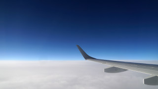 Airplane wing clouds blue sky - free bird wallpaper