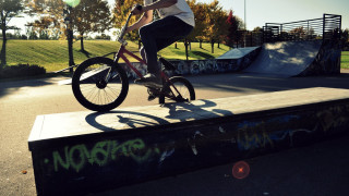 Man bike wooden ramp graffiti - sunny day free wallpaper