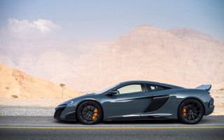 Grey sports car mountain road 2 - a grey sports car free wallpaper