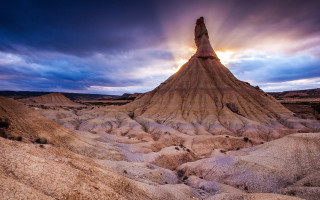 Mountain rock formation sunset sky - free mountains wallpaper