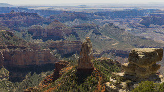 Large cliff tall rock formation 2 - a large cliff free wallpaper