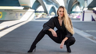 Woman kneeling black outfit highheels 2 - contemporary free wallpaper