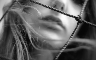 Woman blowing hair fence blackandwhite - hair free wallpaper