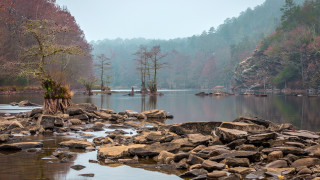 Lake rocks trees foggy sky - a foggy sky above free wallpaper