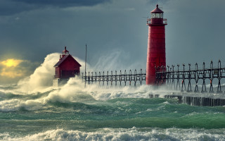 Lighthouse wave stormy beach sunset - large free wallpaper