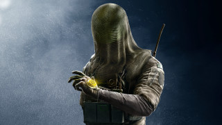 Hooded man yellow object astronaut - suit holding free wallpaper